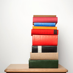 Image showing stack of books on the table