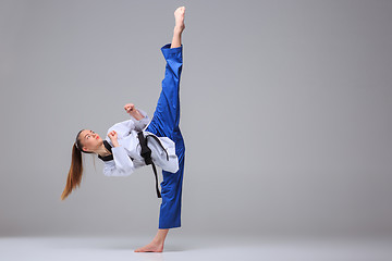 Image showing The karate girl with black belt 