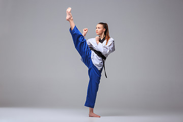 Image showing The karate girl with black belt 