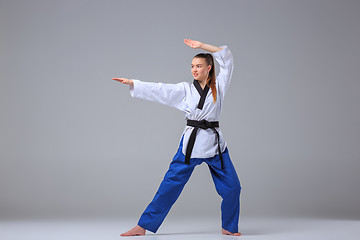 Image showing The karate girl with black belt 