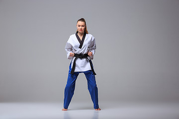 Image showing The karate girl with black belt 