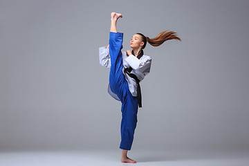 Image showing The karate girl with black belt 