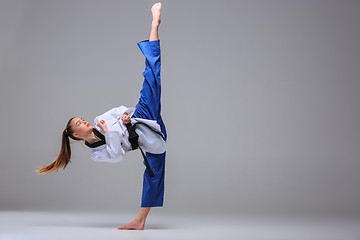 Image showing The karate girl with black belt 