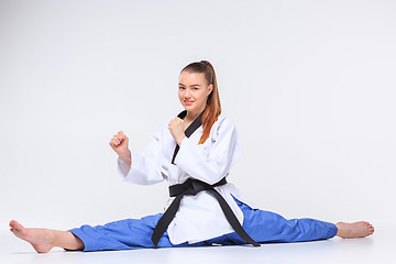 Image showing The karate girl with black belt 