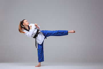 Image showing The karate girl with black belt 