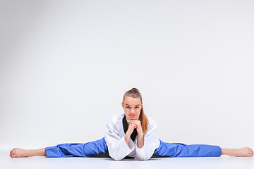 Image showing The karate girl with black belt 