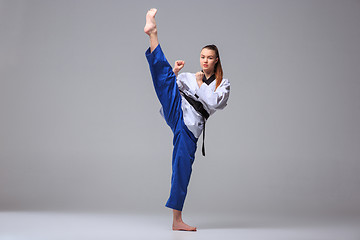 Image showing The karate girl with black belt 