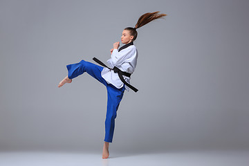 Image showing The karate girl with black belt 