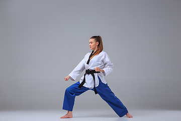 Image showing The karate girl with black belt 