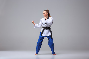 Image showing The karate girl with black belt 