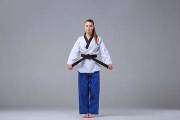 Image showing The karate girl with black belt 