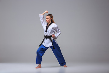 Image showing The karate girl with black belt 