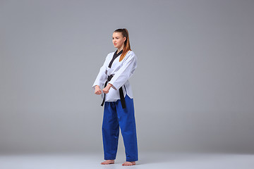 Image showing The karate girl with black belt 