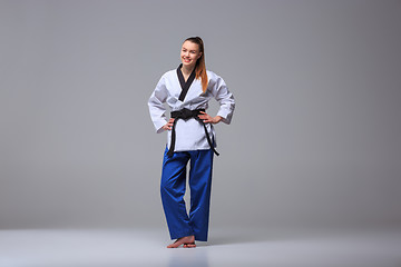 Image showing The karate girl with black belt 