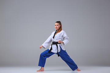 Image showing The karate girl with black belt 