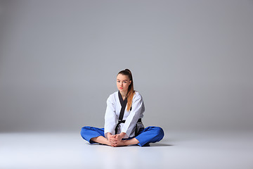 Image showing The karate girl with black belt 