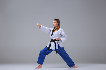 Image showing The karate girl with black belt 