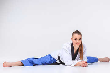 Image showing The karate girl with black belt 