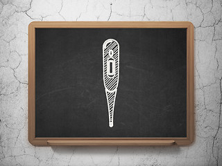 Image showing Health concept: Thermometer on chalkboard background