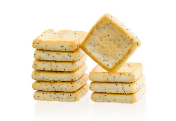 Image showing Stack of square crackers isolated