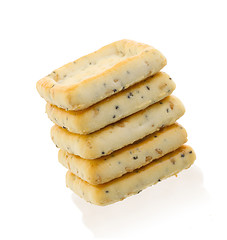 Image showing Stack of square crackers isolated