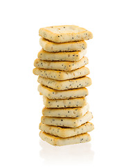 Image showing Stack of square crackers isolated