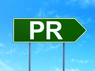 Image showing Advertising concept: PR on road sign background