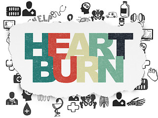 Image showing Medicine concept: Heartburn on Torn Paper background