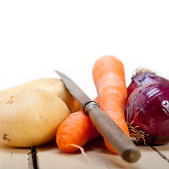 Image showing basic vegetable ingredients carrot potato onion 