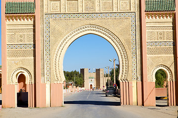 Image showing morocco arch in   old construction street   blue sky