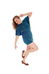 Image showing Woman dancing, looking down.