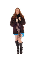 Image showing Pretty woman in coat and boots.