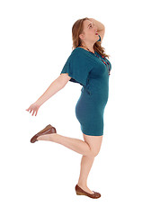 Image showing Woman dancing is dress.