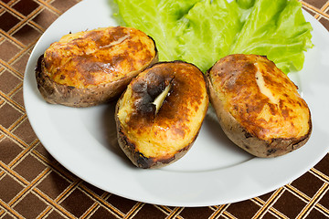 Image showing baked potatoes whole in their skins 