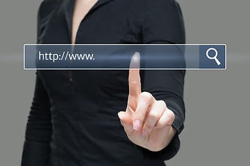 Image showing Young woman touching web browser address bar with www sign