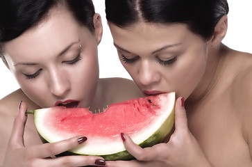 Image showing eating melon