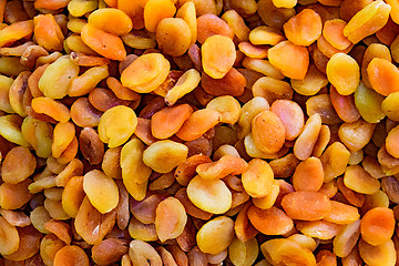 Image showing Dried apricot fruit forming a background.