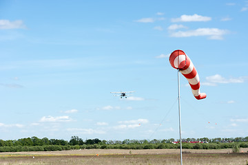 Image showing Windsock against cloudy sky.