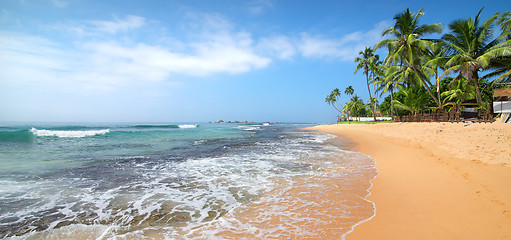 Image showing Foamy waves on beach