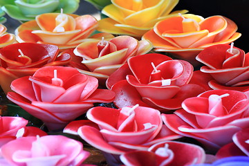 Image showing color flowers candles