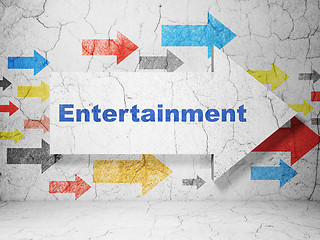 Image showing Entertainment, concept: arrow with Entertainment on grunge wall background