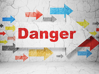 Image showing Safety concept: arrow with Danger on grunge wall background