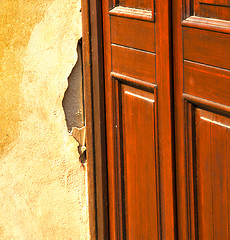 Image showing abstract  church door    in italy  lombardy  red
