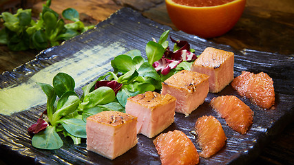 Image showing Grill salmon salad, with mixed greens, avocado,grapefruit. Delicious healthy eating.