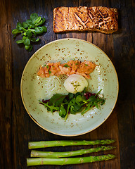 Image showing Poached eggs with salmon and rasparagus