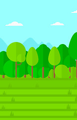 Image showing Background of green lawn with trees.