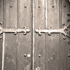 Image showing brown wooden parliament in london old  door and marble antique  