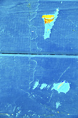 Image showing nail stripped paint in the   door and   