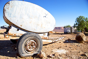 Image showing water tank in tree weel and arid