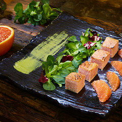 Image showing Grill salmon salad, with mixed greens, avocado,grapefruit. Delicious healthy eating.